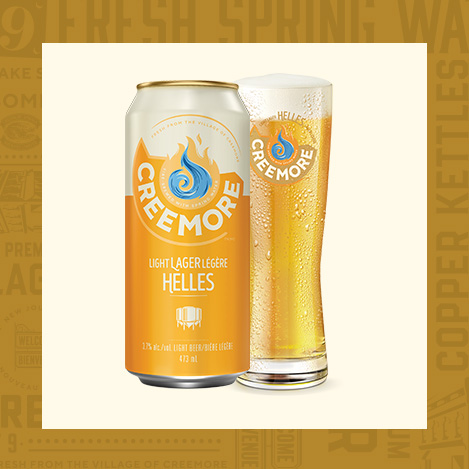 Helles can with glass