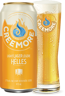 Helles can with glass