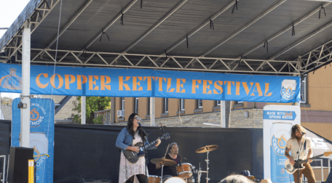 music group sing in a kopper kettle festival